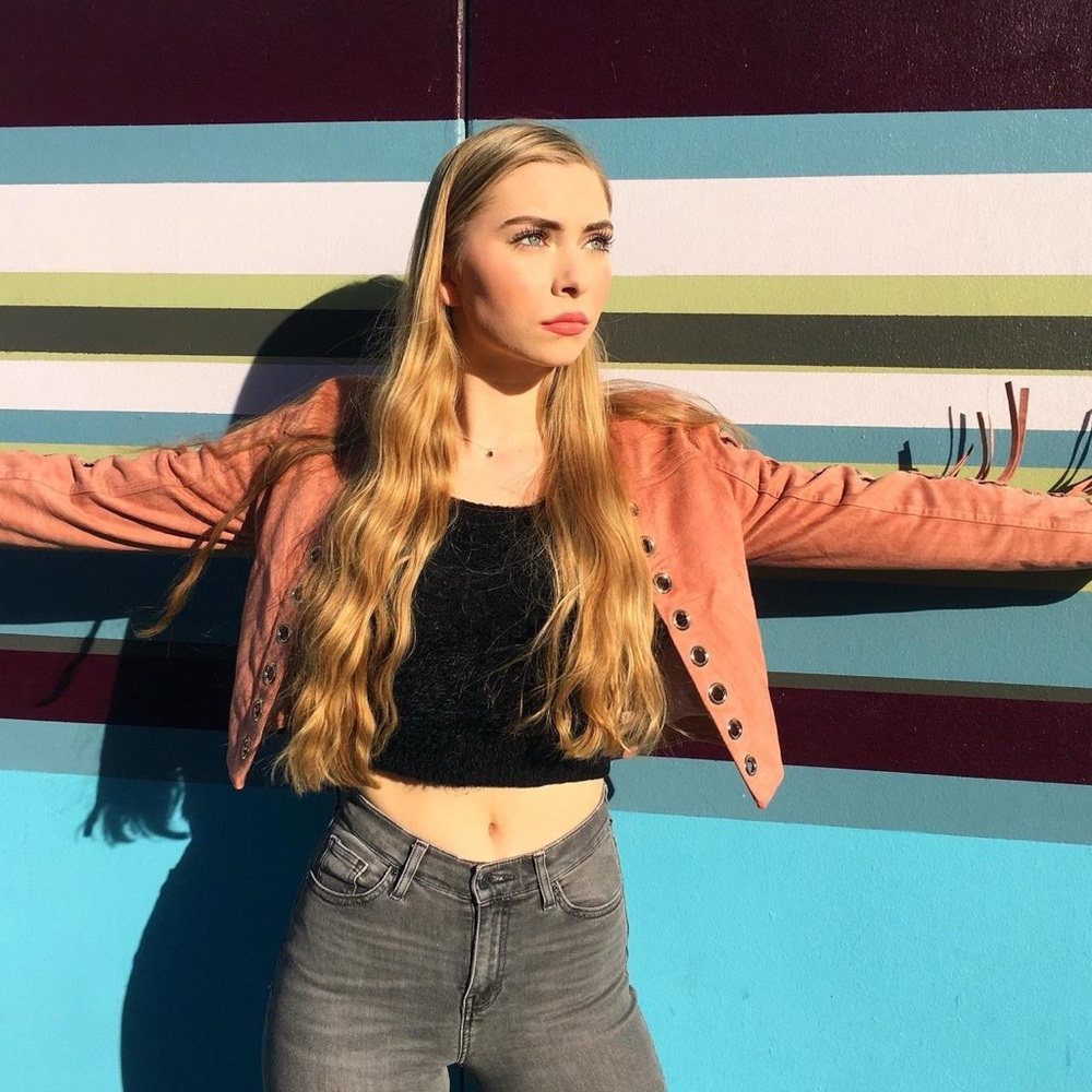 Small like new pink suede jacket with fringe